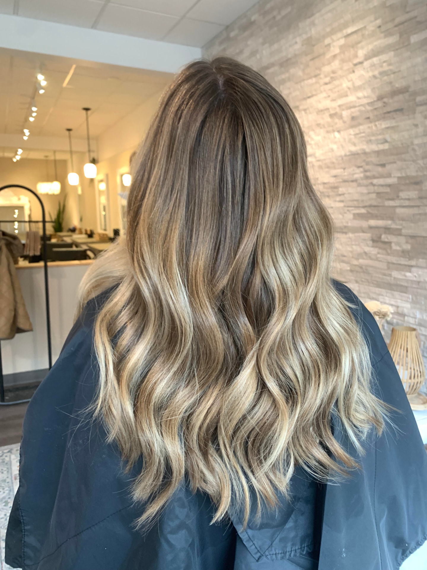 Long dimensional blonde balayage by Emma Yook
