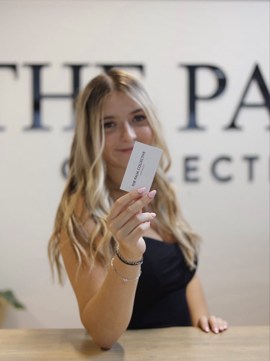 Emma Yook with her signature long blonde balayage